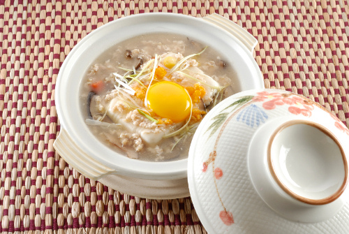 A photo of egg yolks in a Chinese soup.